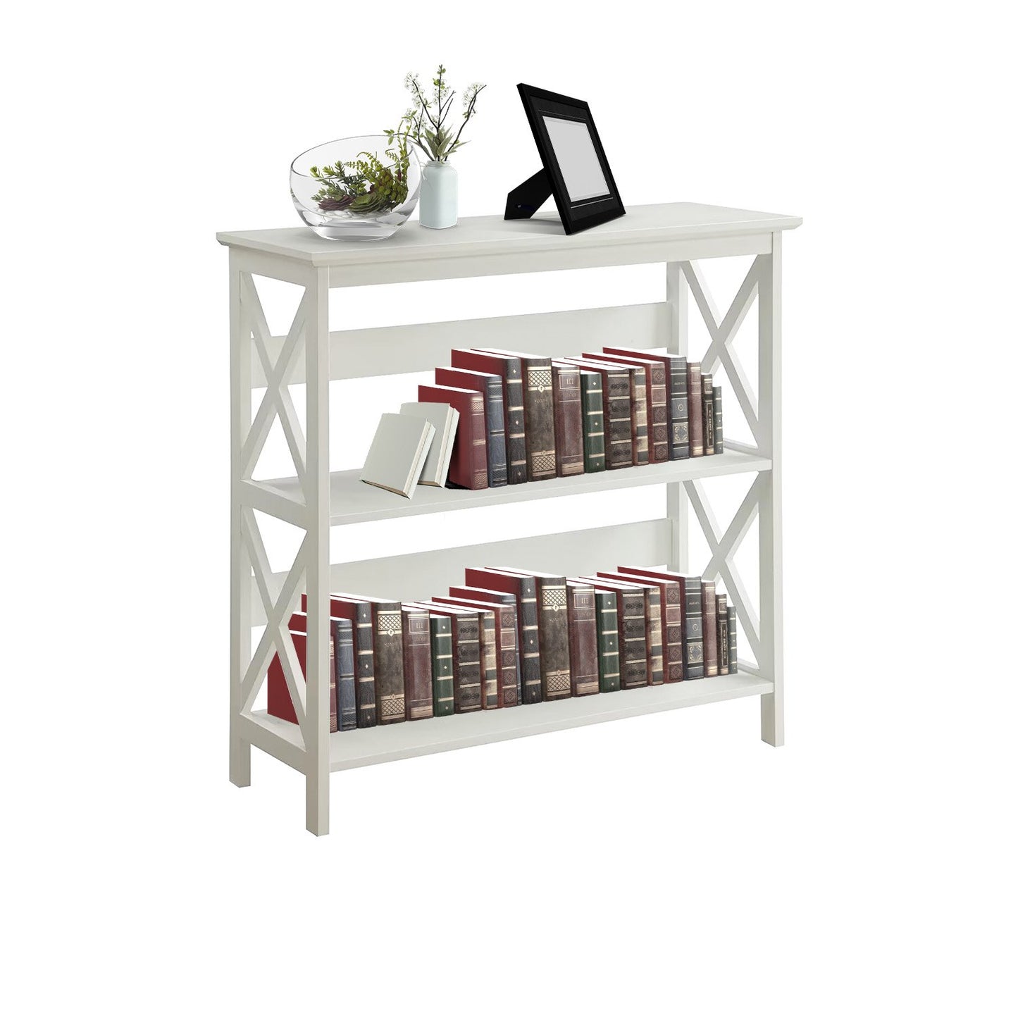 White bookshelf with books and decorative items on a white background