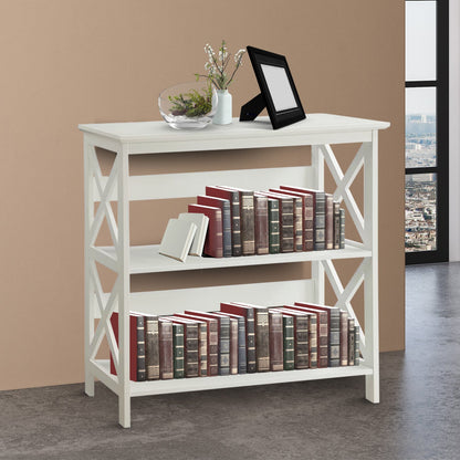 White bookshelf with books and decorative items against a beige wall.