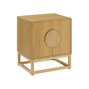 A beige wooden bedside table with a split door shelf and unique geometric base, featuring elegant half-round handles.
