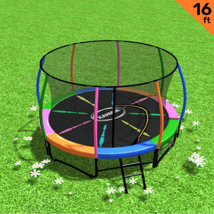 A 16ft round Kahuna trampoline with a safety enclosure net and a ladder, set on a grassy surface with a multicolored padding cover.