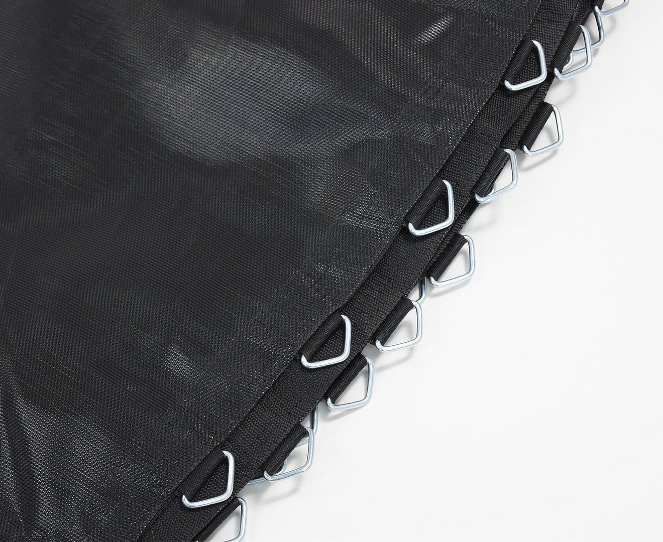 Close-up of a trampoline replacement mat showing the edge with spring loops and the anti-graze rolled finish.