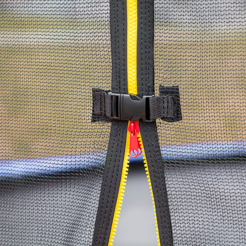 Close-up of a trampoline replacement net attached to a pole with a black zipper and a red and yellow label visible.
