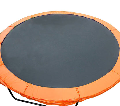 A round orange trampoline safety pad cover placed on a trampoline, designed to fit over the springs to ensure safety and protect against wear.