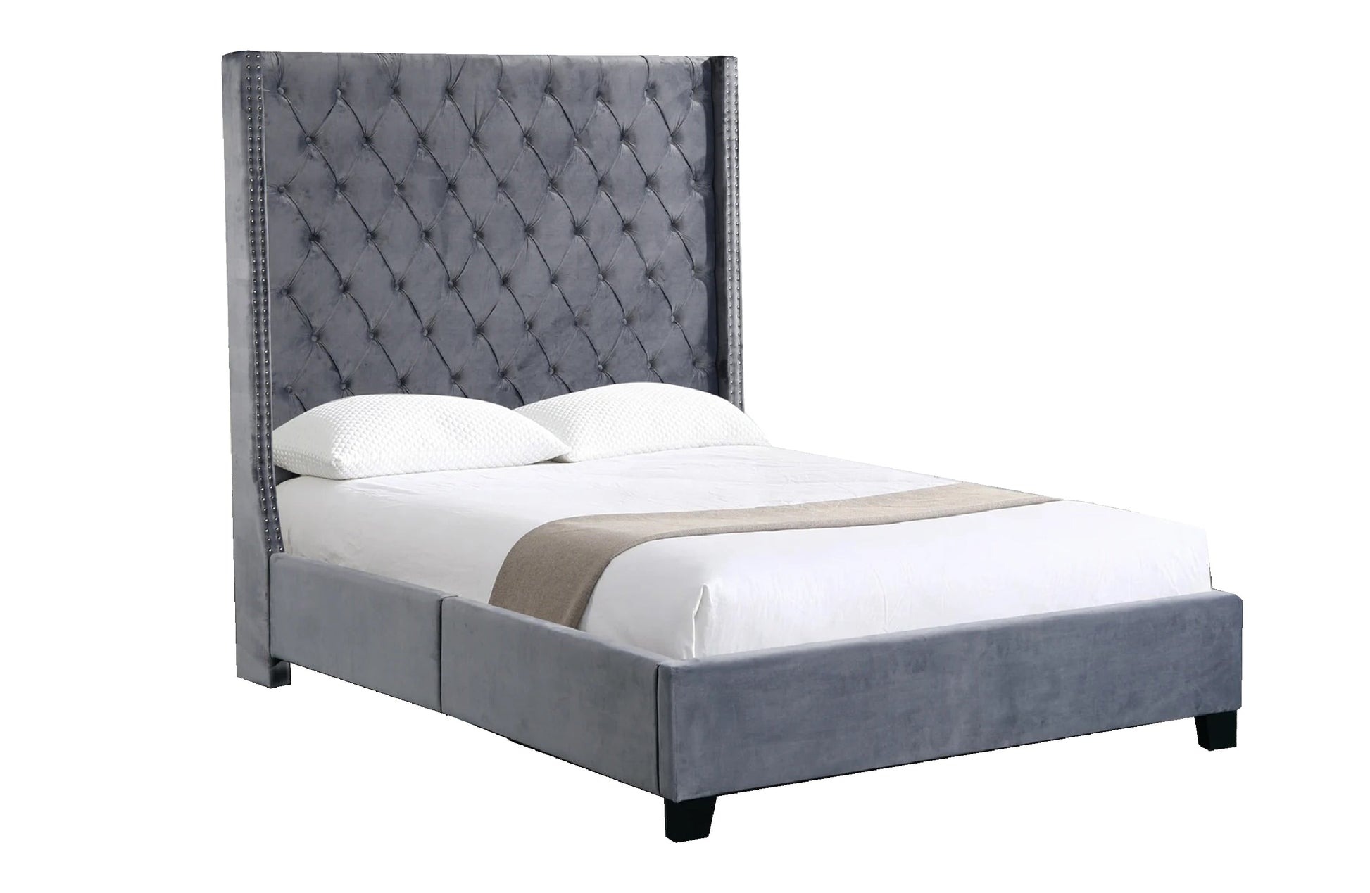 Gray upholstered bed with tufted headboard on a white background