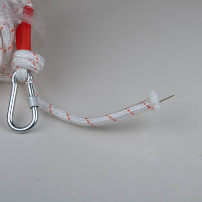 White Climbing Rope with red end and metal carabiner on a light grey background