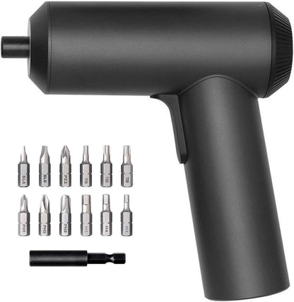 Black impact driver with various drill bits on a white background