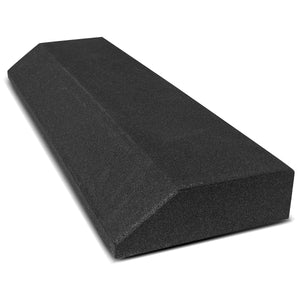 A black  gym floor mat edge, made of recycled rubber granules, with a wedge shape for fitting against mat surfaces.