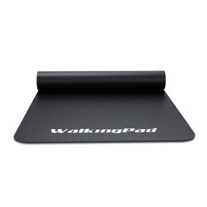 Black exercise mat with 'WalkingPad' branding on a white background