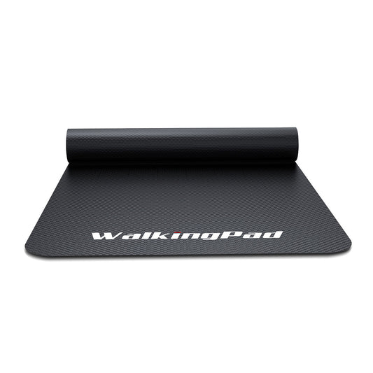 Black exercise mat with 'WalkingPad' branding on a white background