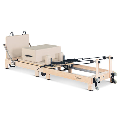 A beige wooden Lifespan Fitness Contour Folding Pilates Reformer Machine Set with smooth wheels and an adjustable footbar, displayed against a white background.