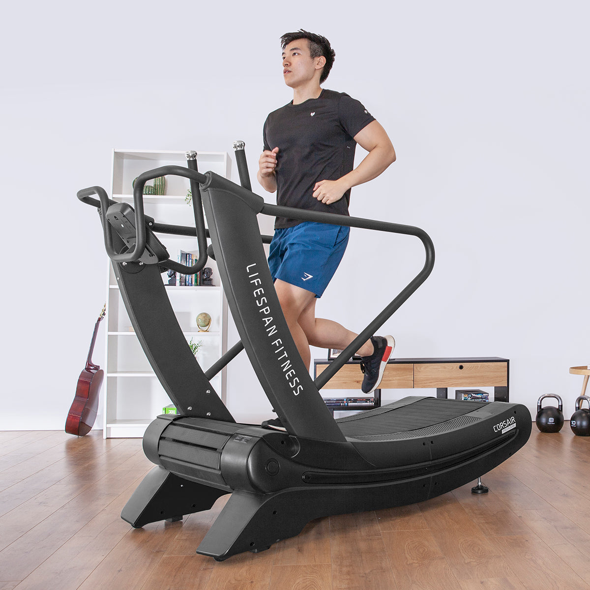 Person using a treadmill in a home gym setting