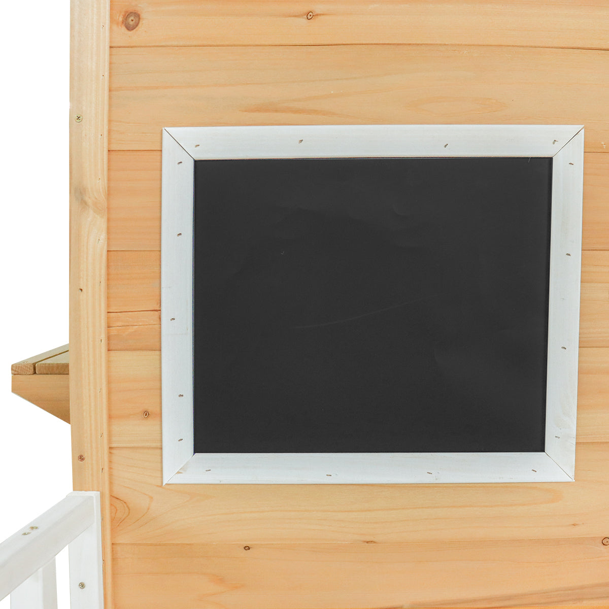 Black chalkboard with silver frame attached to a wooden wall