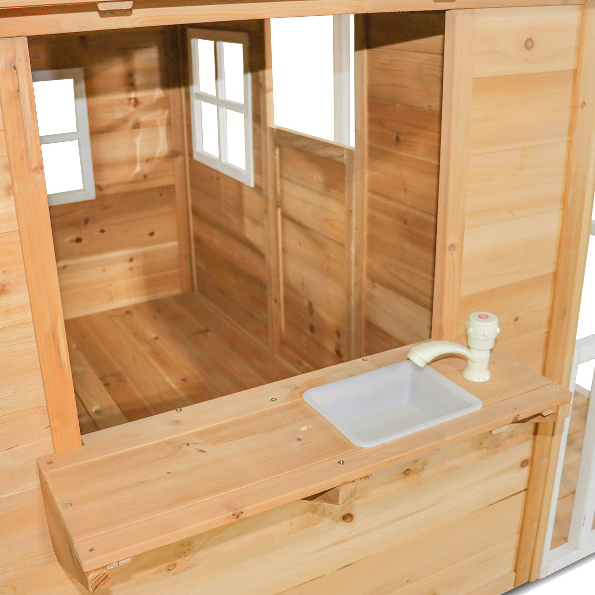 Wooden cabin with a sink and faucet