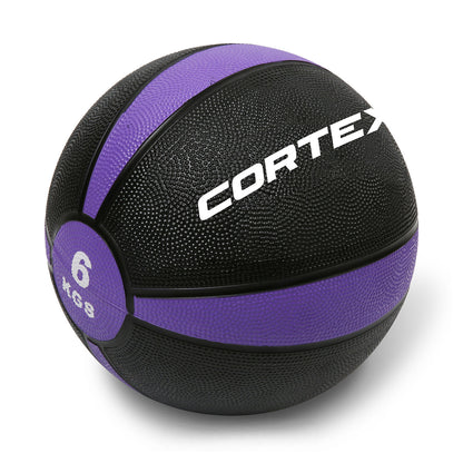 A black and purple Cortex 6kg medicine ball with textured rubber casing.