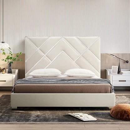 Modern bedroom setup with a bed, nightstands, and decorative items.