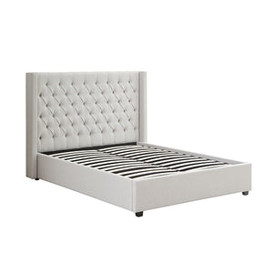 White tufted bed frame on a white background