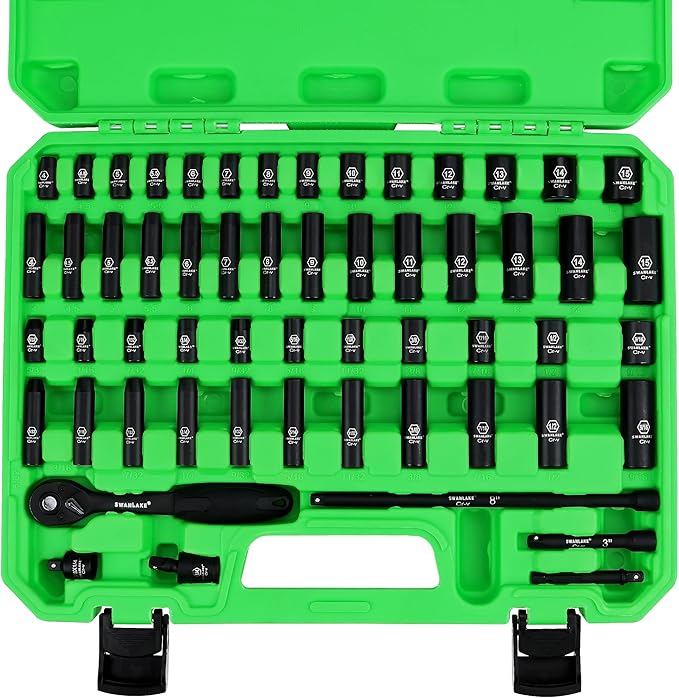 Set of black tools in a green tool case on a white background