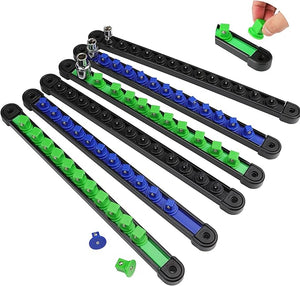 Set of black and green building blocks with blue connectors on a white background