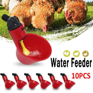 Red water feeder with yellow spout for chickens on a white background