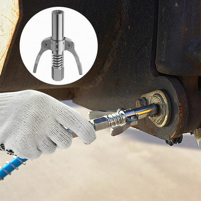 Person using a metal tool to remove a rusted brake caliper on a vehicle.