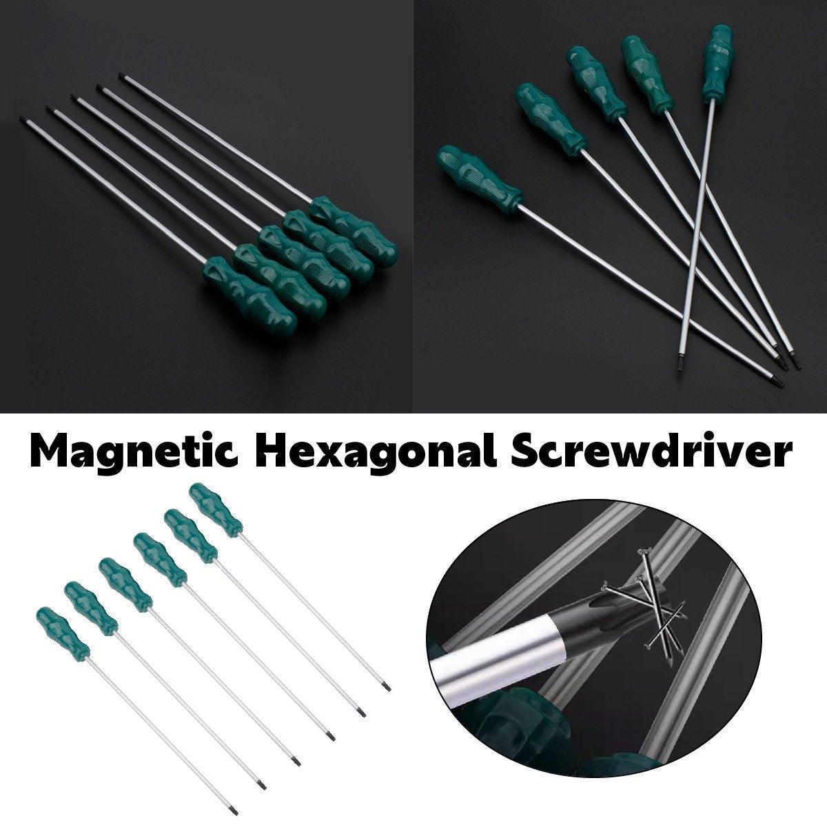 Set of magnetic hexagonal screwdrivers with green handles on a black background.