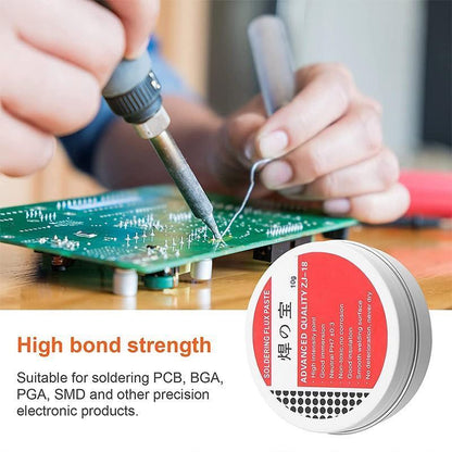Person soldering a circuit board with a tin of soldering flux paste labeled 'High bond strength'.