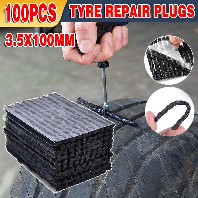  tyre repair plugs with a hand using a tool on a tire
