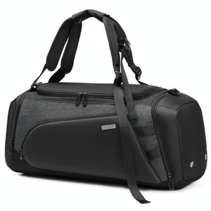 A large grey gym bag with separate compartments for wet and dry items, featuring multiple zippers and a thick handle.