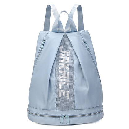 Blue sports backpack with adjustable shoulder straps, a main compartment, and side zipper pockets, constructed from oxford cloth material.