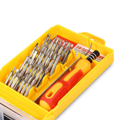 Screwdriver set with various bits in a yellow case on a white background