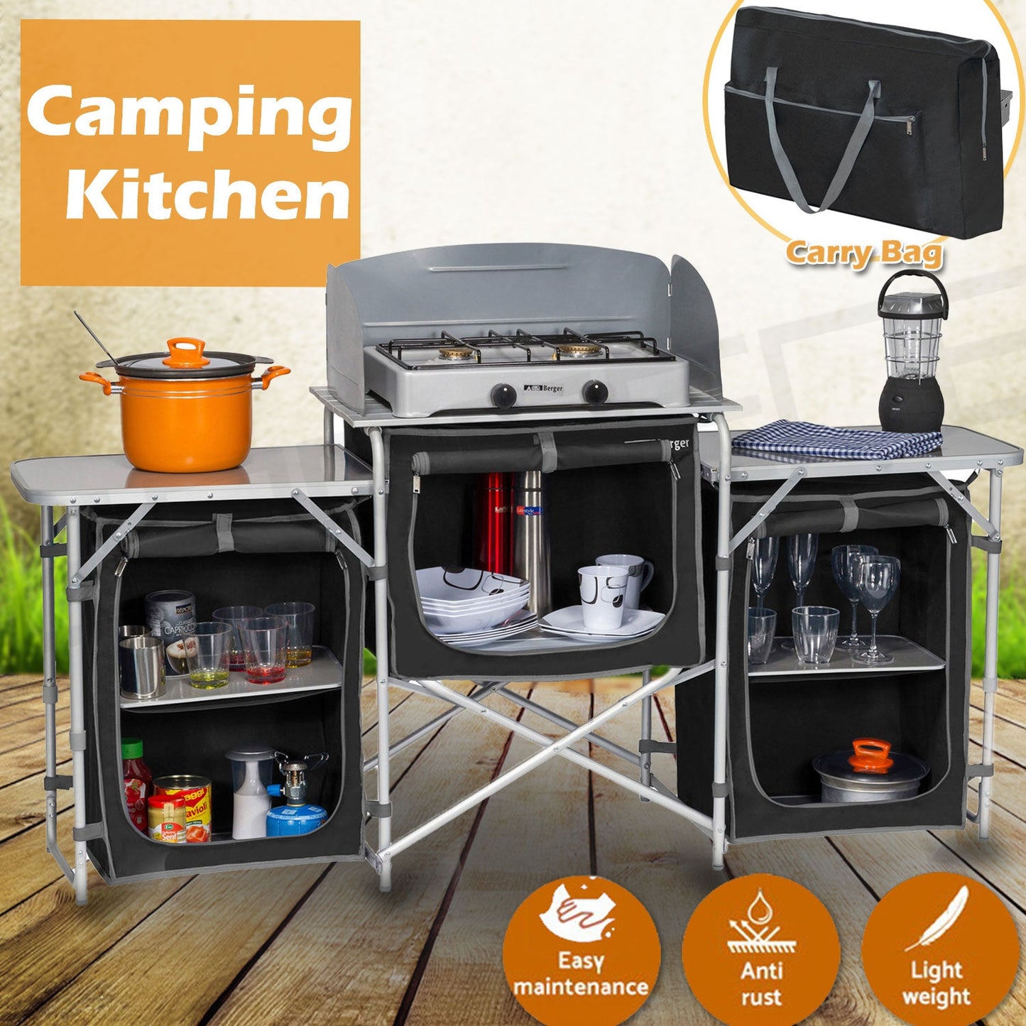 A foldable camping kitchen with a built-in cupboard and bench, set up on a wooden surface. It includes a portable stove, pots, plates, and other kitchen utensils.