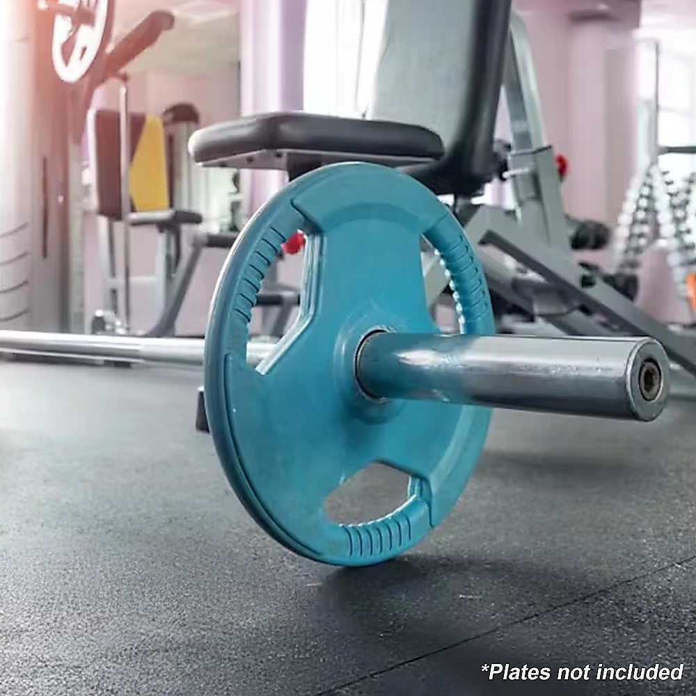 Blue weight plate attached to a barbell in a gym setting