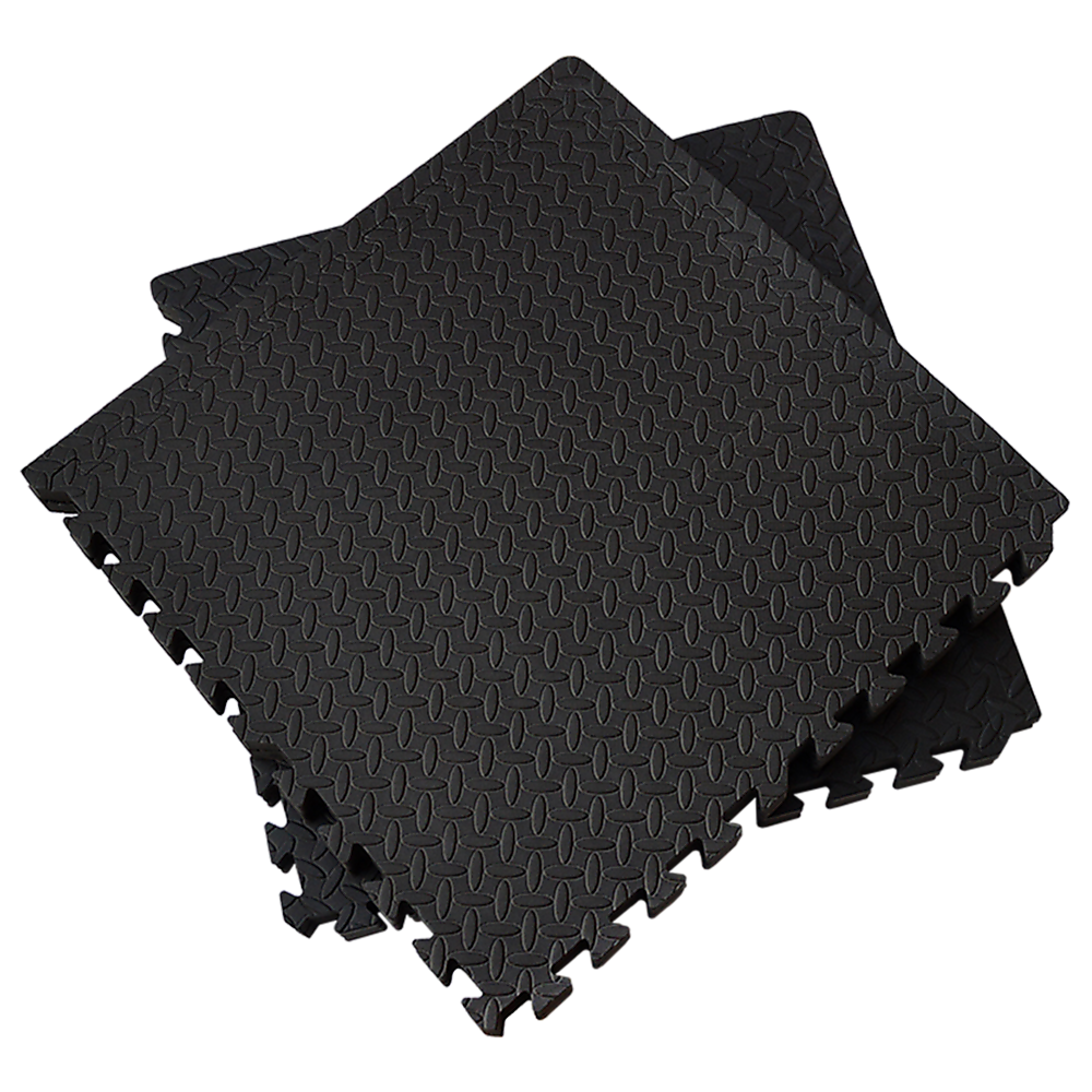 Black foam puzzle mats on a white background
