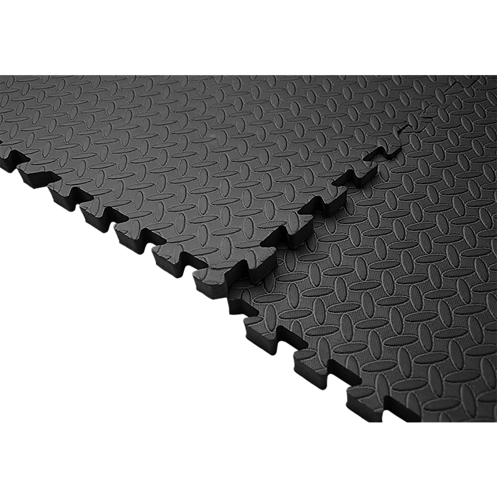 Black interlocking foam mats on a white background