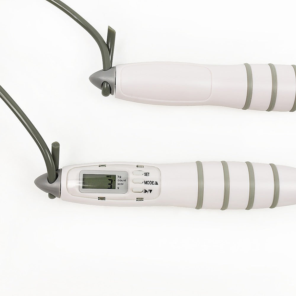 White digital jump rope with green accents on a white background