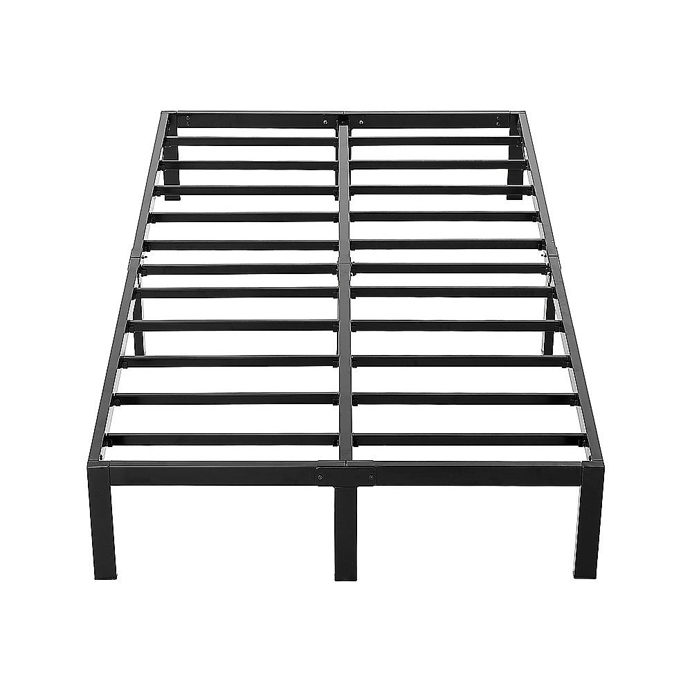 Black metal bed frame on a white background