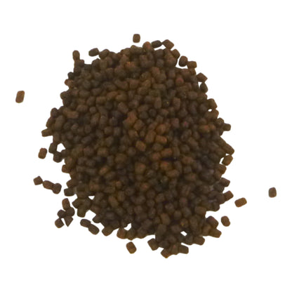 Brown pellets on a white background