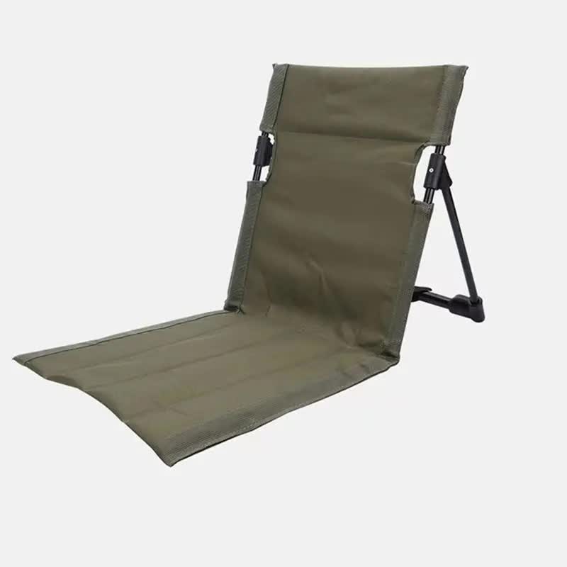 Green folding Beach chair on a white background