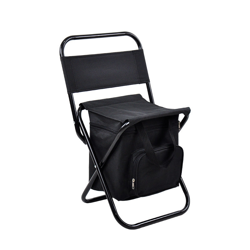 A folded black camping chair with a storage bag on top, designed for outdoor activities.