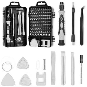 Set of small tools including screwdrivers and tweezers on a white background