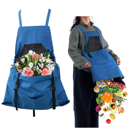 Blue apron with a pocket filled with flowers and another with groceries on a white background