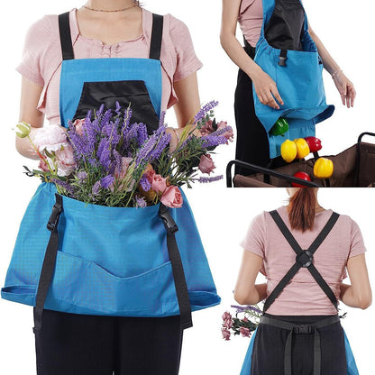 Blue apron with pockets filled with flowers and groceries, worn by a person.