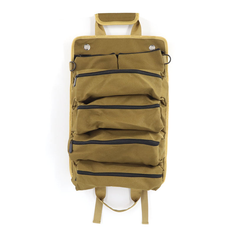 Brown backpack with multiple pockets on a white background