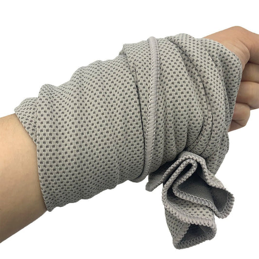 Hand wearing a gray textured glove on a white background