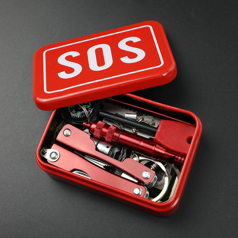 Red SOS tool kit with various tools on a dark background