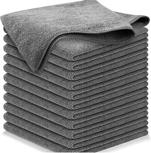 Stack of gray towels on a white background