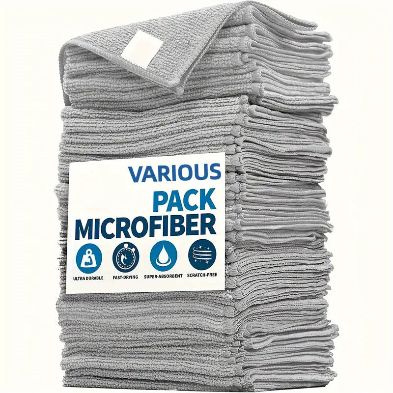 Stack of gray microfiber cloths with a label indicating various pack options on a white background.