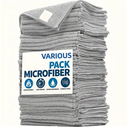 Stack of gray microfiber cloths with a label indicating various pack options on a white background.
