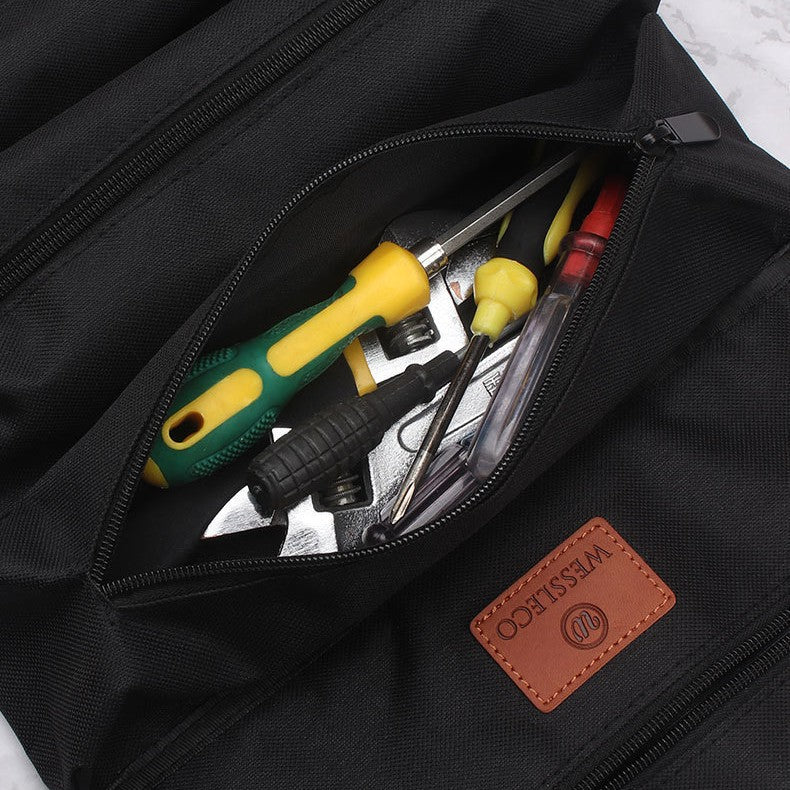 Black bag with tools inside, featuring a visible brand logo.