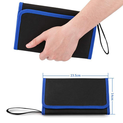 Black and blue fabric roll-up with a hand holding it and measurements displayed.